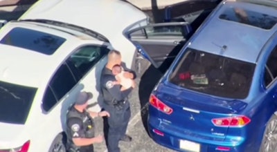 Corona, California, police officers rescued a baby who was locked into a 110-degree car.