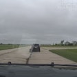 Fond du Lac County (Wisconsin) Sheriff's deputies pursue a suspect on a small airport's runway.